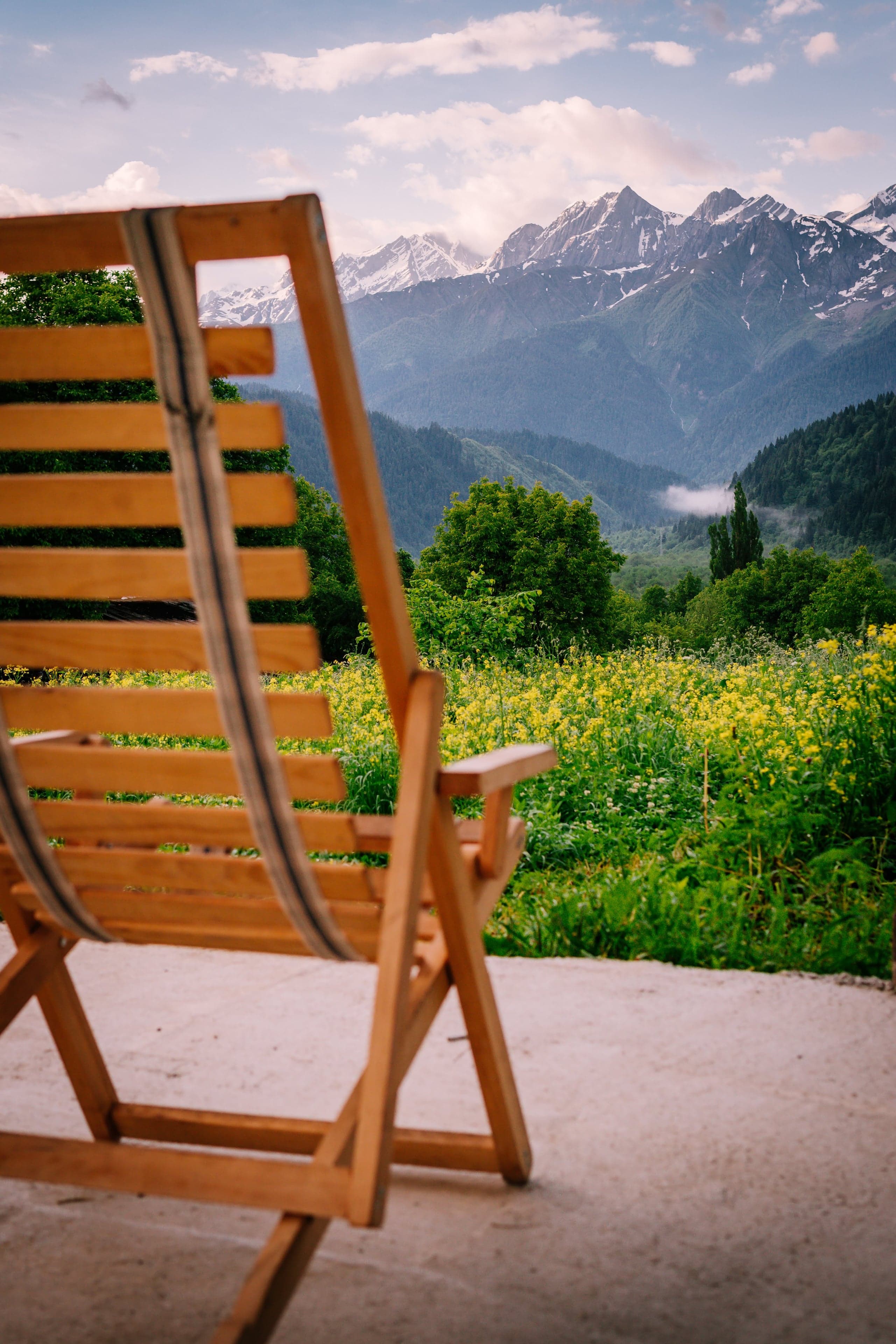 Lounge seating with mountain landscape view at Chiora Inn, Georgia